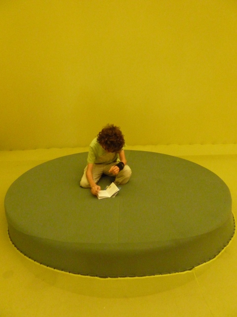 Green nylon for a floor and circular pad at Ernesto Neto, Hayward Gallery London