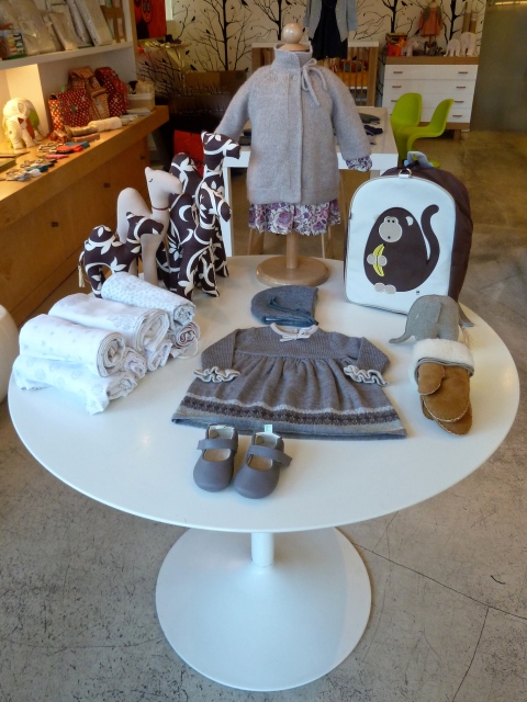Colour toned baby clothes and accessories at Yoya shop in Manhattan