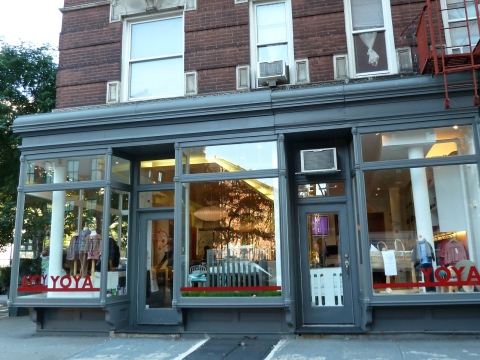 Double fronted shop window for Yoya baby and kids fashion store at 636 Hudson St NYC 10014